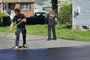 Image of a freshly sealcoated residential driveway in Bucks County, PA