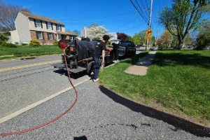 A truck that dispenses asphalt for sealcoating - Superior Sealcoating in Honey Brook, PA - Superior Sealcoating