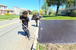 Image of a residential driveway being sealcoated