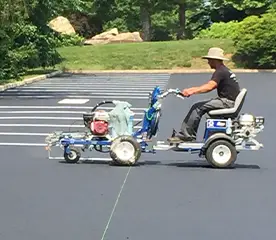 team members doing seal coating