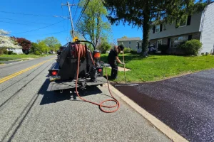 Image of a residential driveway being sealcoated