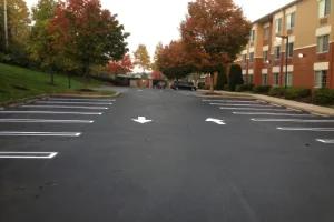 Image of a freshly sealcoated parking lot