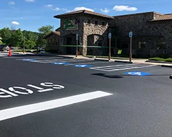 Image of a restaurant parking lot with newly painted lines in the parking lot