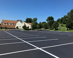 Image of newly painted lines in a residential community parking lot