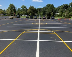 Image of freshly painted lines at a large commercial parking lot