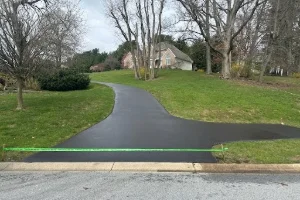 Image of a residential driveway being sealcoated