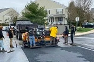 A commercial lot getting paved by Superior Sealcoating employees  - Paving in Coatesville, PA - Superior Sealcoating