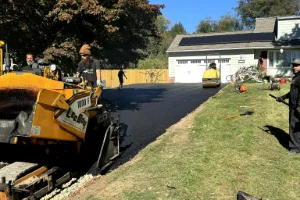 A residential driveway getting paved - Residential Asphalt Paving in Chester County, PA - Superior Sealcoating