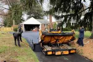 A residential driveway getting paved - Residential Asphalt Paving in Chester County, PA - Superior Sealcoating