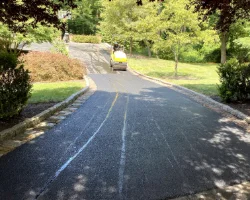 Residential driveway in the process of resealing in Chester Springs, PA
