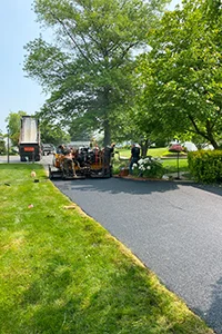 Image of a freshly sealcoated residential driveway in West Chester, PA